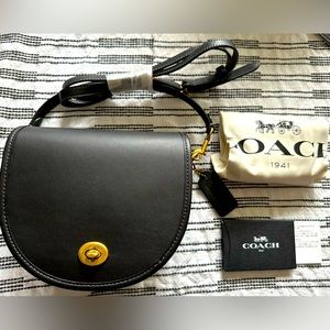Coach Turnlock Saddle Crossbody bag
